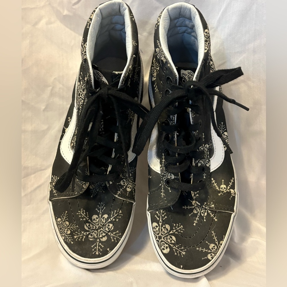 Women’s Vans Black High-Top Sneakers with White Stripe and Snowflake Skull Print